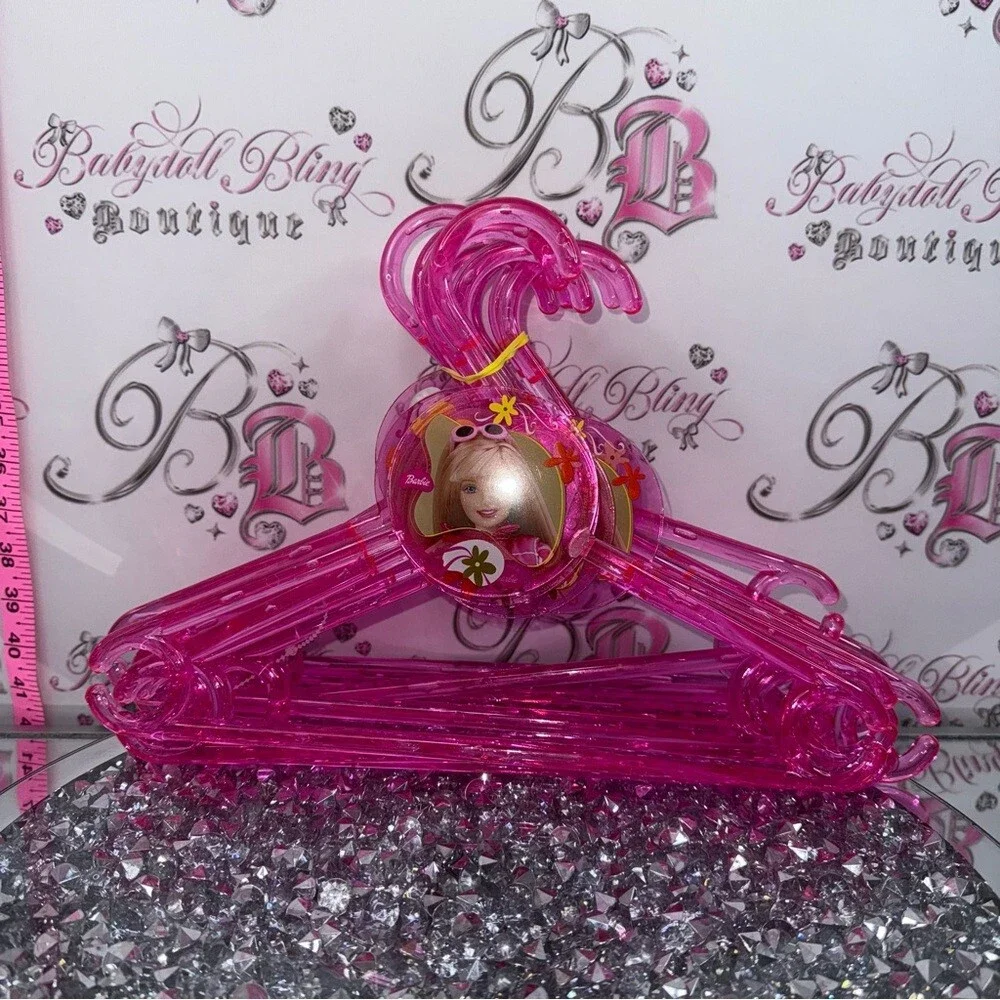 12 Barbie hangers 2001 Bright Pink acrylic Plastic Hangers with Character Accent